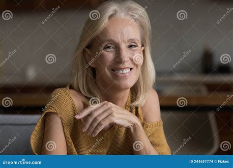 Happy Cheerful Skinny Mature 60s Woman Home Head Shot Portrait Stock