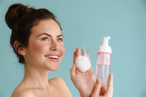 Half Naked Brunette Woman Smiling While Showing Cleaning Foam Stock