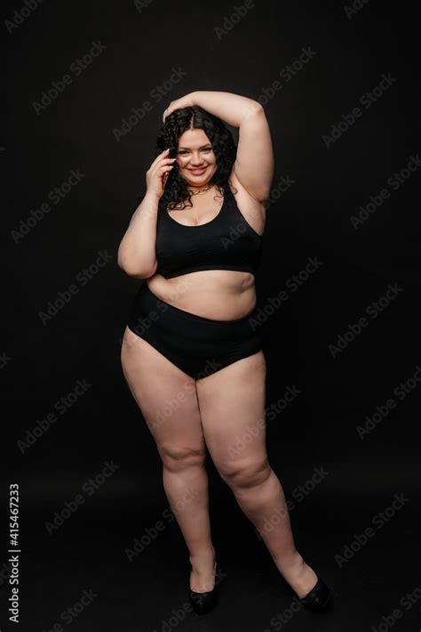 Plus Size Model In Lingerie Fat Sexy Woman In Underwear On Black Studio Background Body