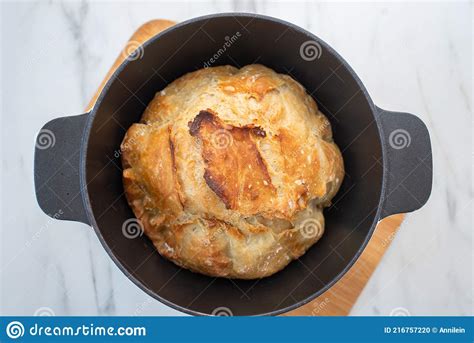 Fresh No Knead Bread in a Cast Iron Dutch Oven Stock Photo - Image of ...