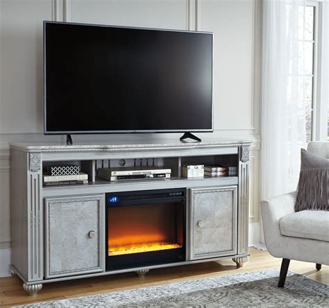 Zolena Brown LG TV Stand With Glass And Stone Fireplace from Ashley | Coleman Furniture