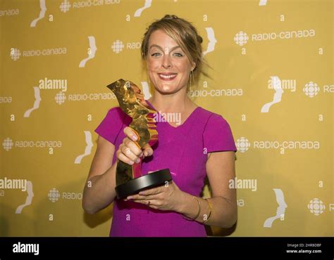 Julie Le Breton holds up her trophy for best actor in a comedy for her ...