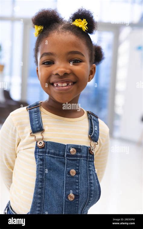 Portrait Of Happy African American Girl Patient In Waiting Room At