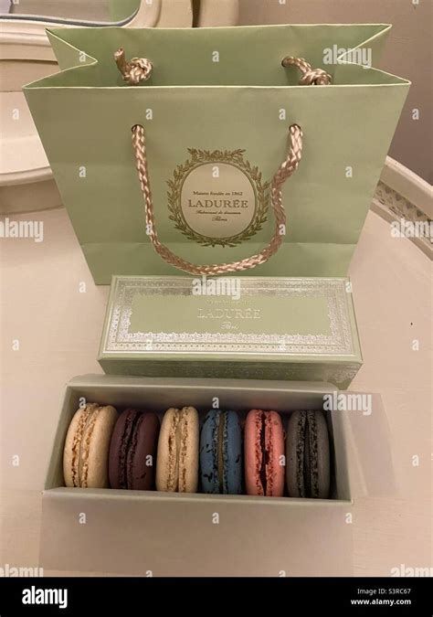 A Box Of Macarons From Ladur E With A Bag April Stock Photo Alamy