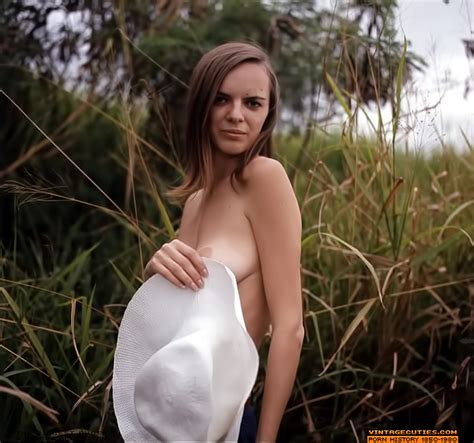 Busty Retro Brunette Girl Playing With Her XXX Dessert Picture