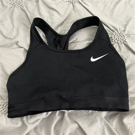 Black sports bra from Nike. Worn a couple times and... - Depop