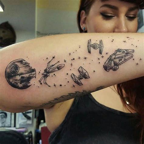 A Woman With A Star Wars Tattoo On Her Arm