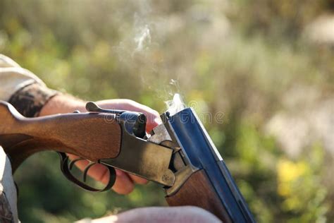 Hunter Holding a Gun Close Up Stock Photo - Image of mans, holding: 166728874