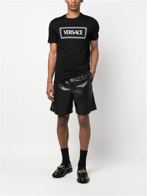 Versace Playera Con Logo Bordado A Os Negro Farfetch Mx