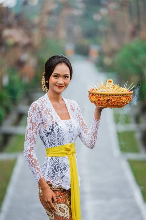 Beautiful Balinese Woman Wearing Kebaya In The Penglipuran Bali Village