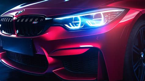 Premium Photo A Close Up Of A Red Bmw Car With Its Headlights Turned