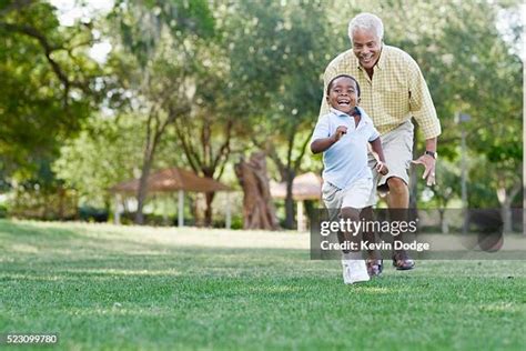 Older Black Man With Grandkids Photos And Premium High Res Pictures