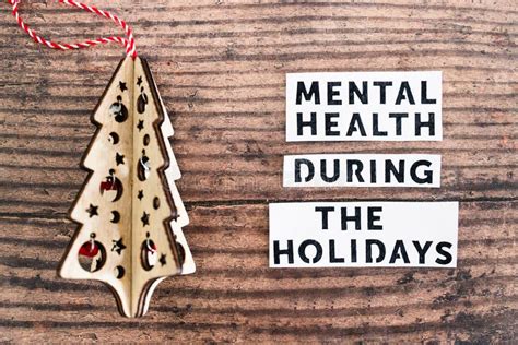 Mental Health During The Holidays Text Next To Festive Christmas