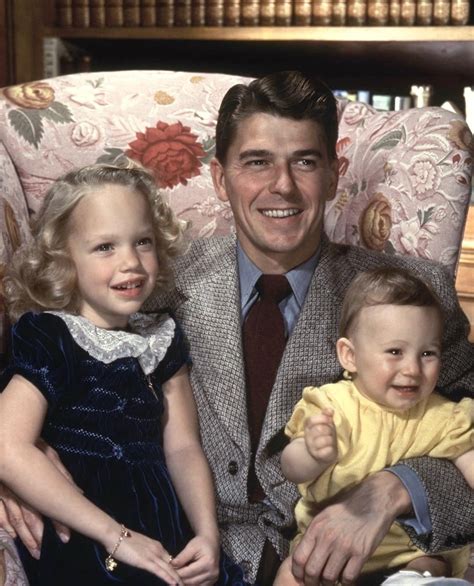 Ronald Reagan with his daughter Maureen and adopted son Michael in 1945 ...