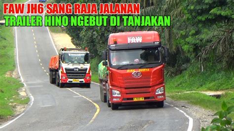 TRUK FAW JH6 SAN RAJA JALANAN MUATAN BESI TRAILER HINO NGEBUT DI