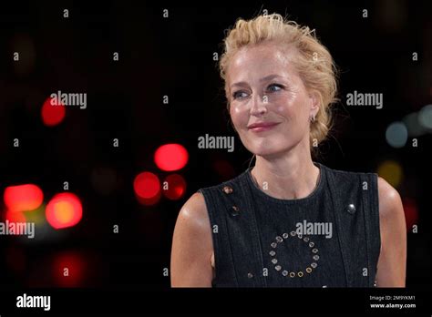 Gillian Anderson Poses For Photographers Upon Arrival For The World