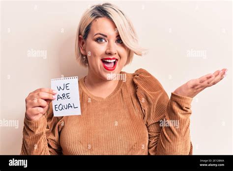 Beautiful Blonde Plus Size Woman Asking For Equality Holding Paper With We Are Equal Message