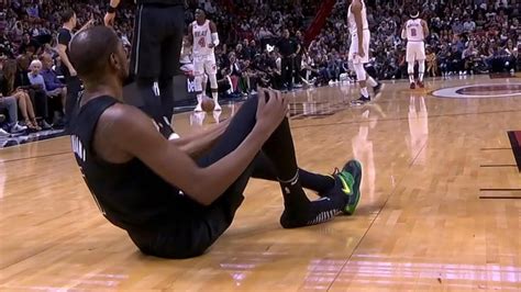 Kevin Durant Goes Down With Apparent Knee Injury After Colliding With