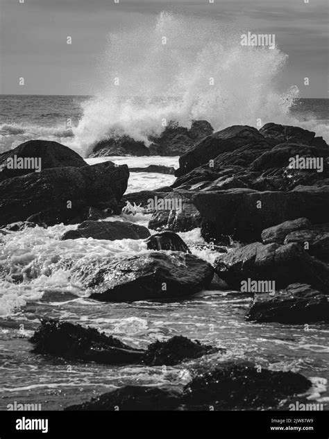 Waves Crashing Over The Rock Pools Of Church Cove Stock Photo Alamy