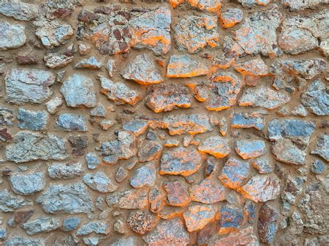 Muro De Piedra De Textura De Fondo De Piedras Redondas Adoquines