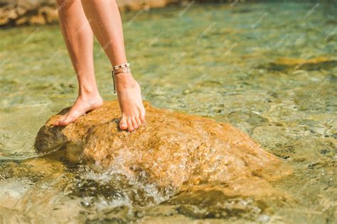 Premium Photo Bracelet On Legs Woman At Sea Beach