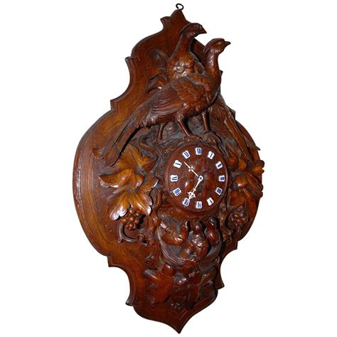 Sizable Antique And Hand Carved Black Forest Wooden Wall Clock W Brass