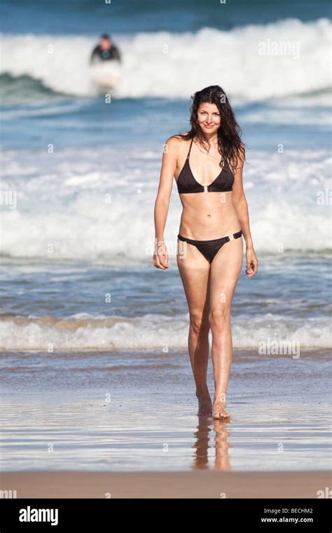 A woman in the surf at Bondi Beach in Sydney, Australia Stock Photo - Alamy