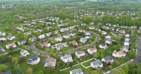 Aerial View Over Suburban Homes And Roads Aerial View Of Residential