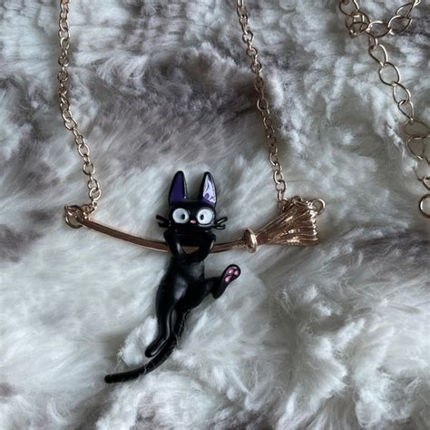 Hot Topic Jewelry Studio Ghibli Kikis Delivery Service Jiji Hanging Necklace Poshmark