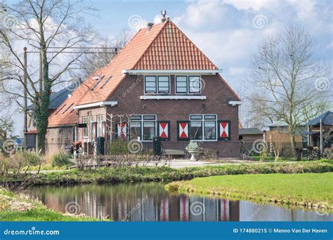 Traditional Dutch Farmhouse Along The Water Near Gouda Stock Image