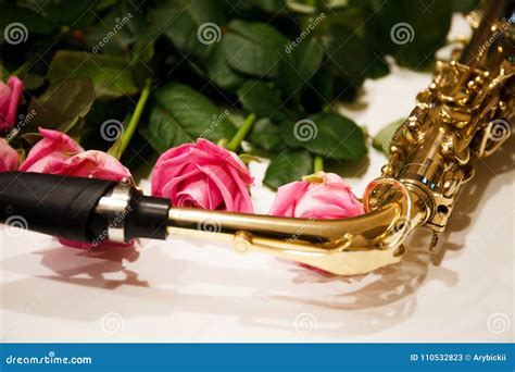 Saxophone With Roses Close Up Stock Image Image Of Instrument Brass