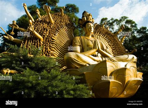 A Gold One Thousand Armed Buddhist Statue At The Temple Of