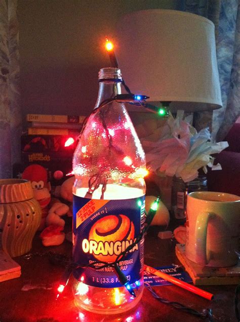 Orangina bottle lamp with Christmas lights inside and outside. Orangina ...