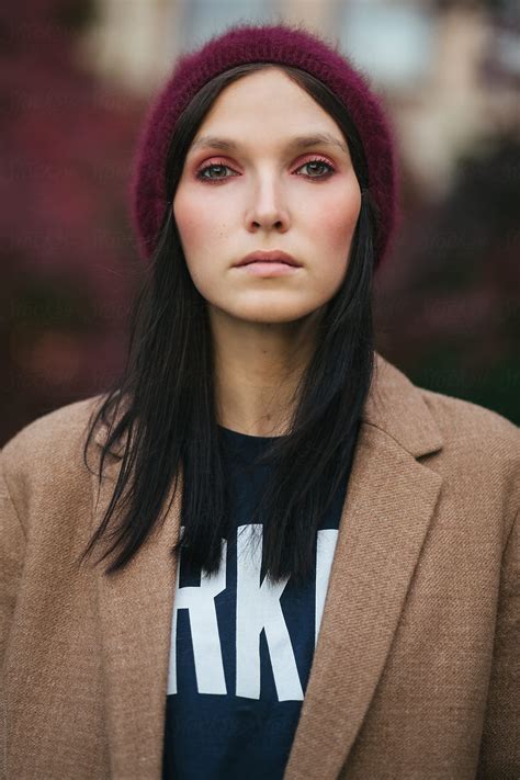 "A Portrait Of A Beautiful Woman With Rosy Cheeks On A Fall Day" by