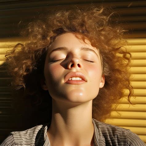 Premium Photo A Woman With Curly Hair And Eyes Closed