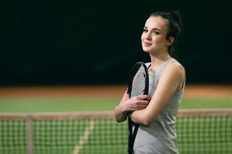 Premium Photo | Tennis woman player playing training with racket and ...