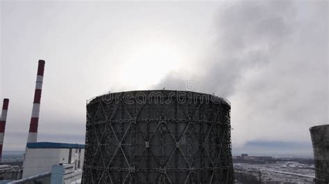 The Cooling Tower Releases A Cloud Of Steam Into The Atmosphere 4k