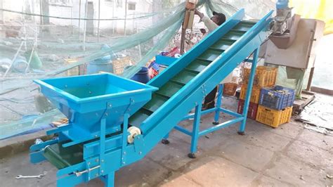 Mild Steel Industrial Cleated Belt Conveyor Capacity 200 Kg Feet At