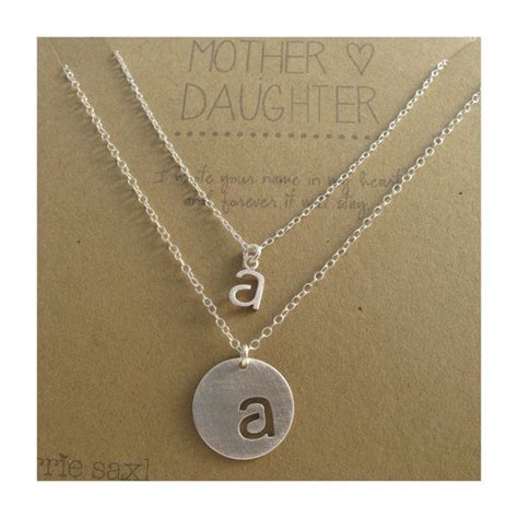 Mother Daughter Necklace Set Features A Hand Cut Initial Silhouette