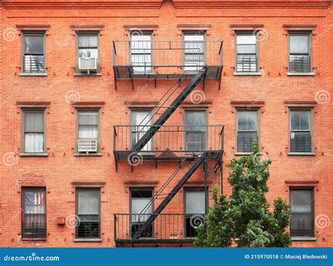 Old Red Brick Building With Iron Fire Escape New York City Usa Stock