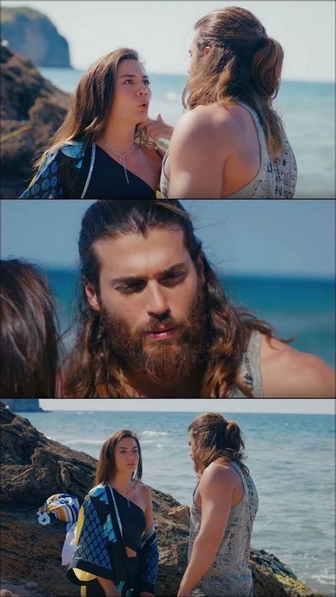 Two People Standing Next To Each Other Near The Ocean And One Person