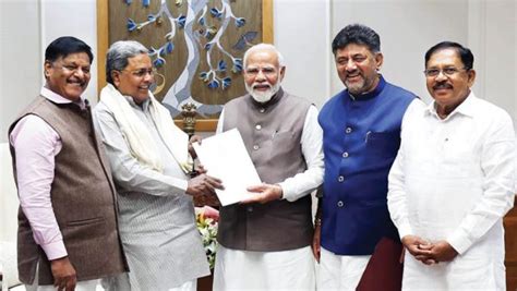 CM Siddaramaiah Meets PM Modi Star Of Mysore