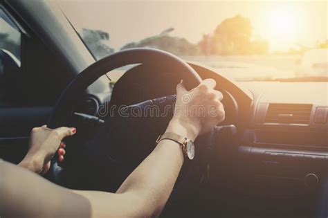 Driving Car on Road with Sunset Stock Image - Image of road, person: 123792013