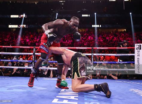 Deontay Wilder Knocks Down Tyson Fury For The First Of Two Knockdowns