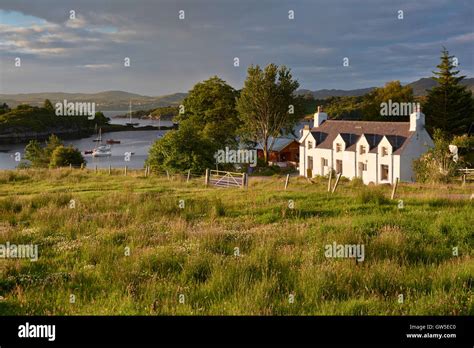 Cottage At Badachro Village In The Scottish Highlands Stock Photo Alamy