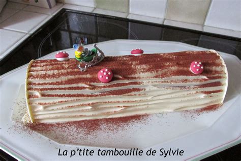 Bûche chocolat blanc framboises meringue desserts repas de fête