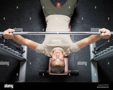 Man Lifting Barbell Stock Photo Alamy