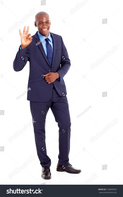 Black Businessman Giving Ok Hand Sign Stock Photo 129699323 - Shutterstock