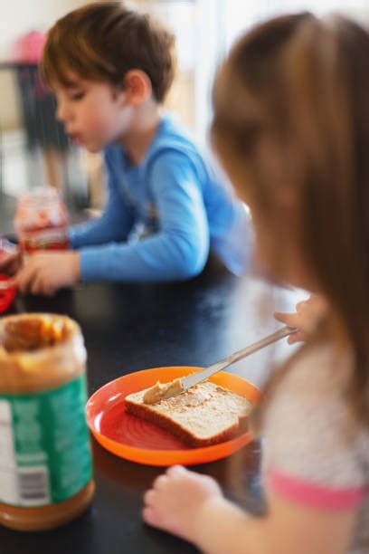 60+ Boy Eating Peanut Butter Sandwich Stock Photos, Pictures & Royalty ...