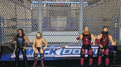 WWE Tag Team Steel Cage Match Roman Reigns And Daniel Bryan Vs Rowan